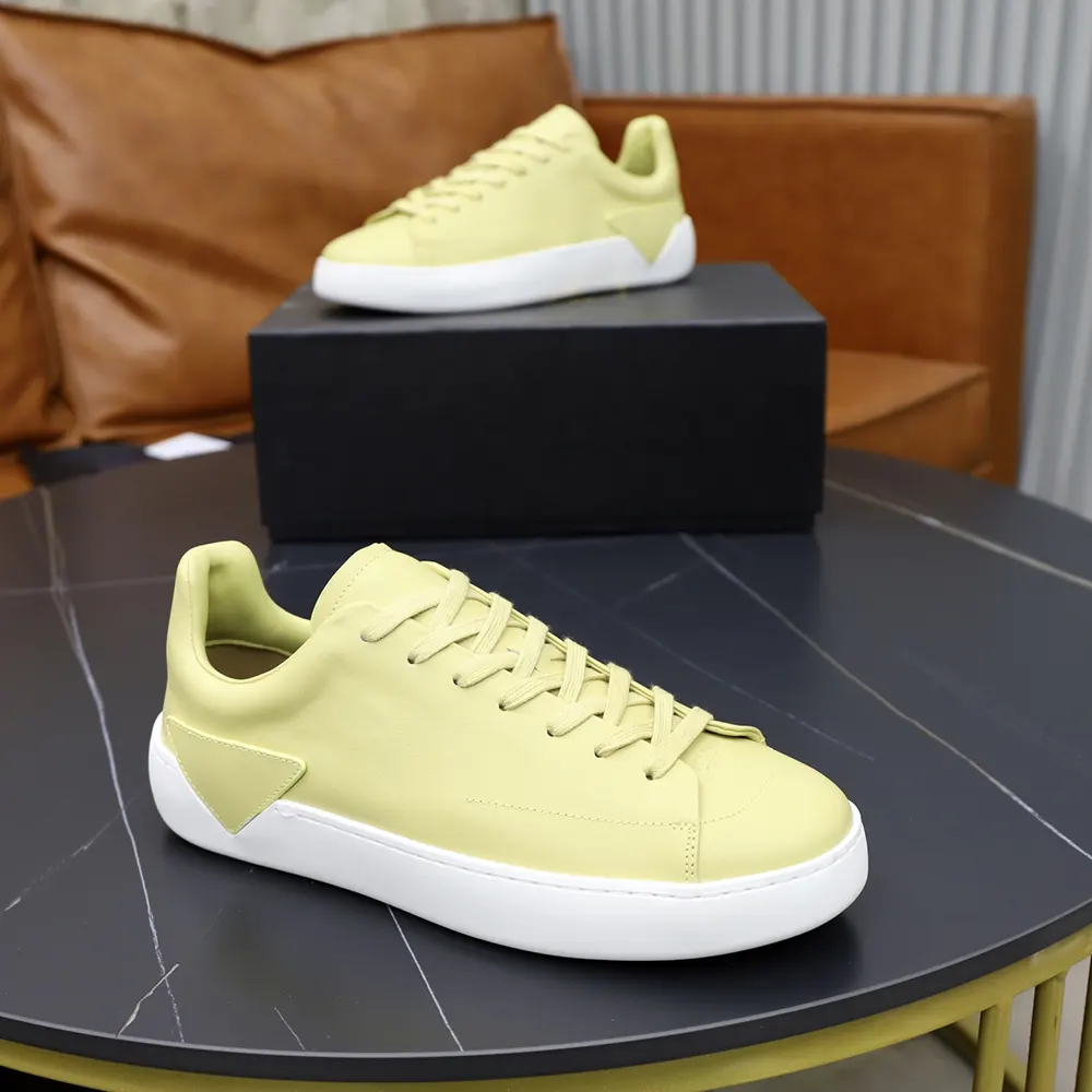 Close-up detail of lace-up and Prada logo on Court Leather Sneakers-Pineapple