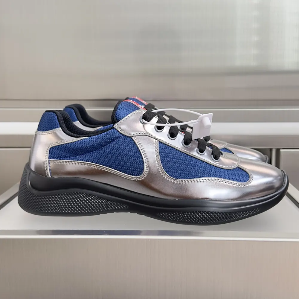 Top angle showing lace-up closure on Prada Unisex Patent Leather and Technical Fabric Sneakers