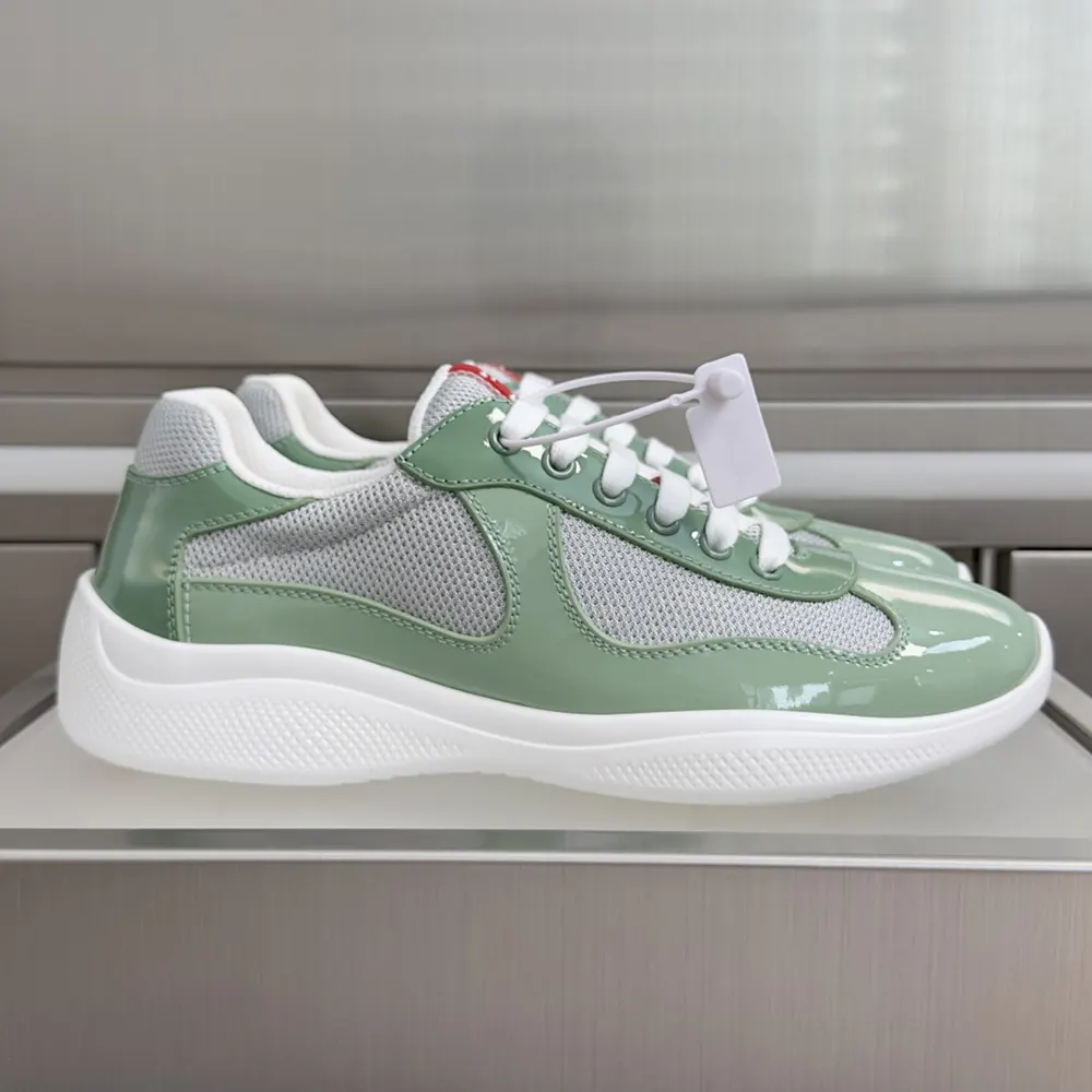 Top angle showing lace-up closure and signature detailing on Prada America’S Cup Sneakers-Aqua