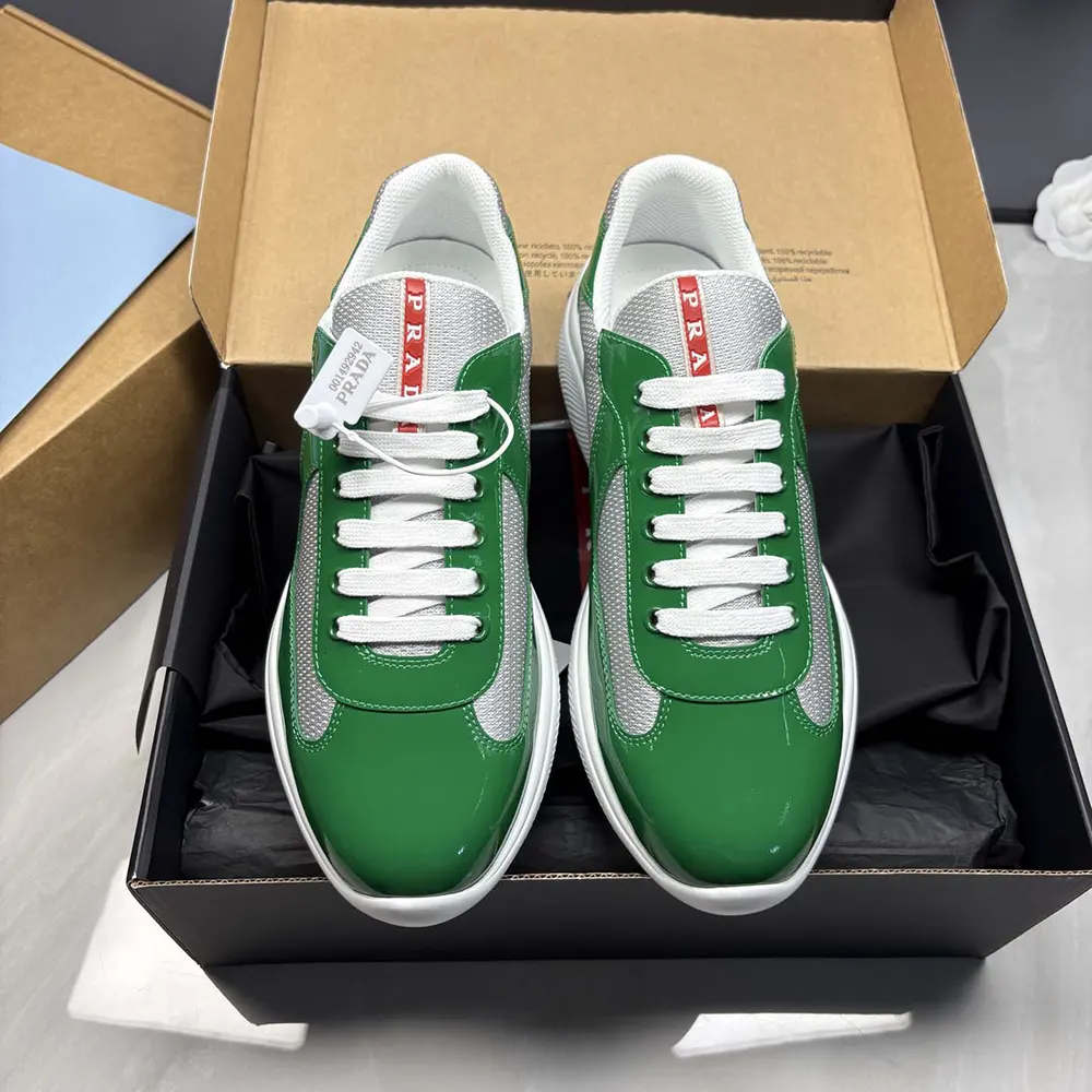 Close-up on green patent leather and technical fabric details of Prada America’S Cup sneakers