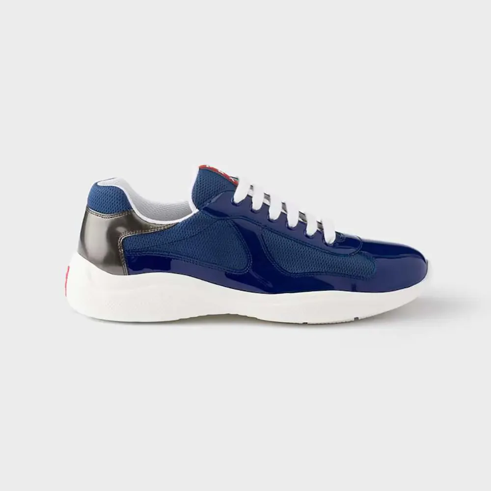 Side profile of Prada Unisex Patent Leather And Technical Fabric Prada America’S Cup Sneakers-Navy