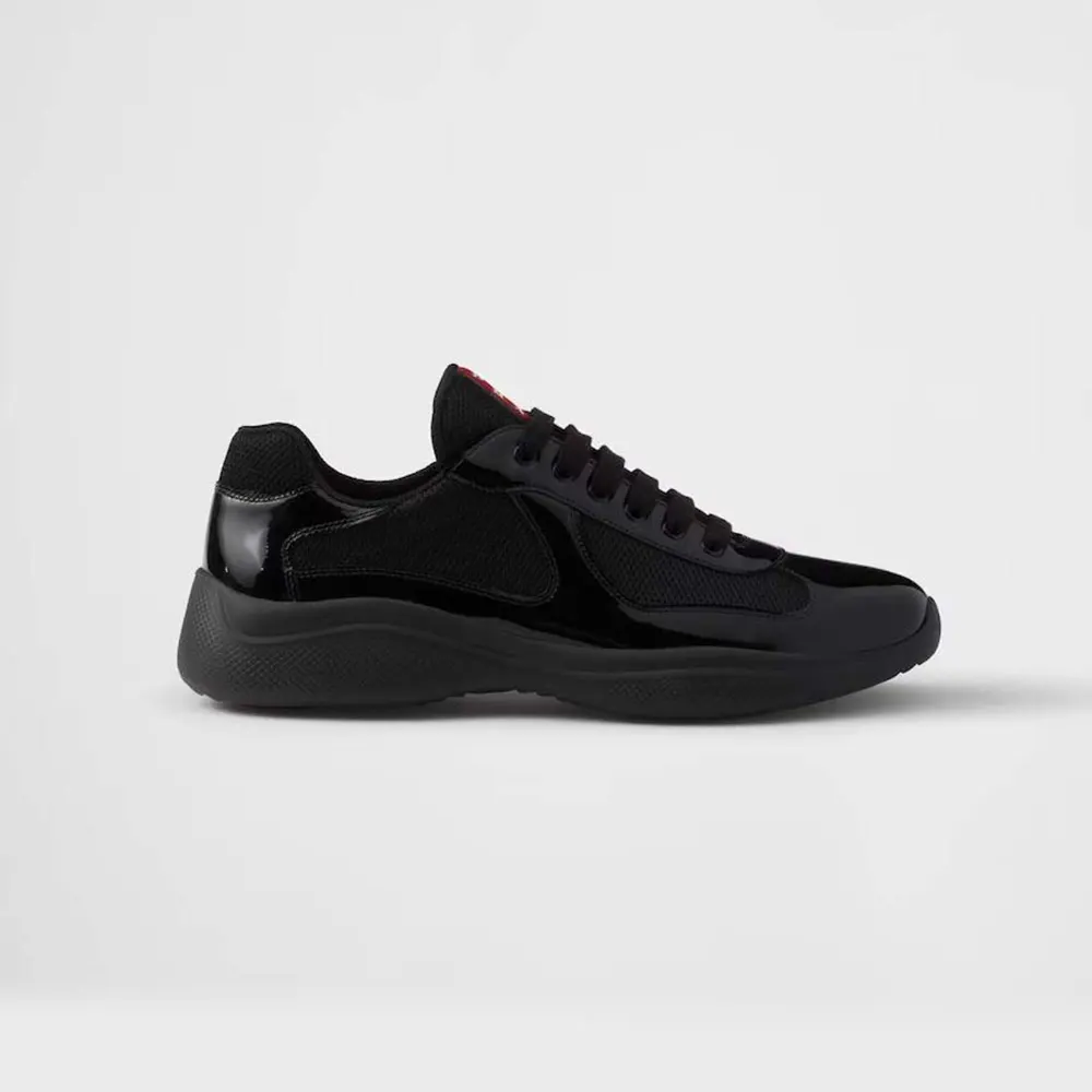 Side profile of Prada Unisex Patent Leather and Technical Fabric Prada America’s Cup Sneakers-Black