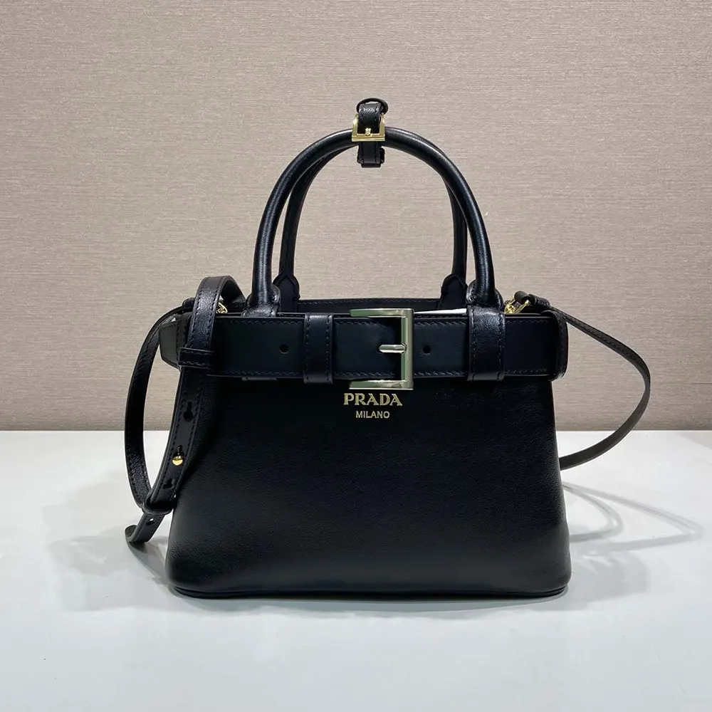 Close-up of buckle detail on Prada Wome Buckle Small Leather Bag