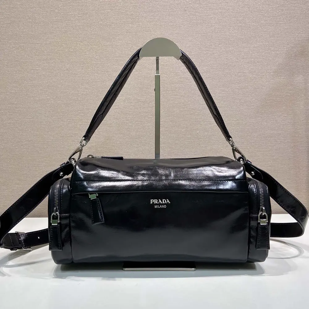 Close-up detail of silver hardware on Prada Women Distressed Nappa Leather Shoulder Bag