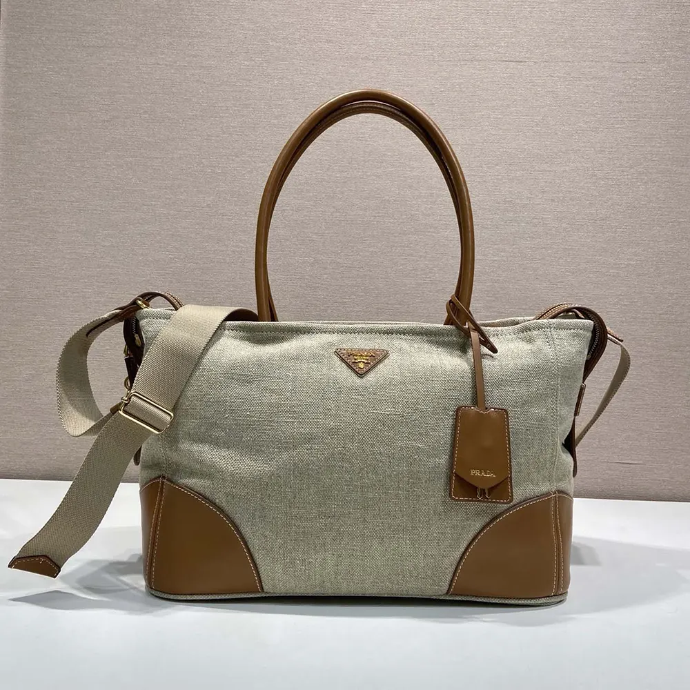 Close-up of rope closure and silver hardware on Prada natural tote