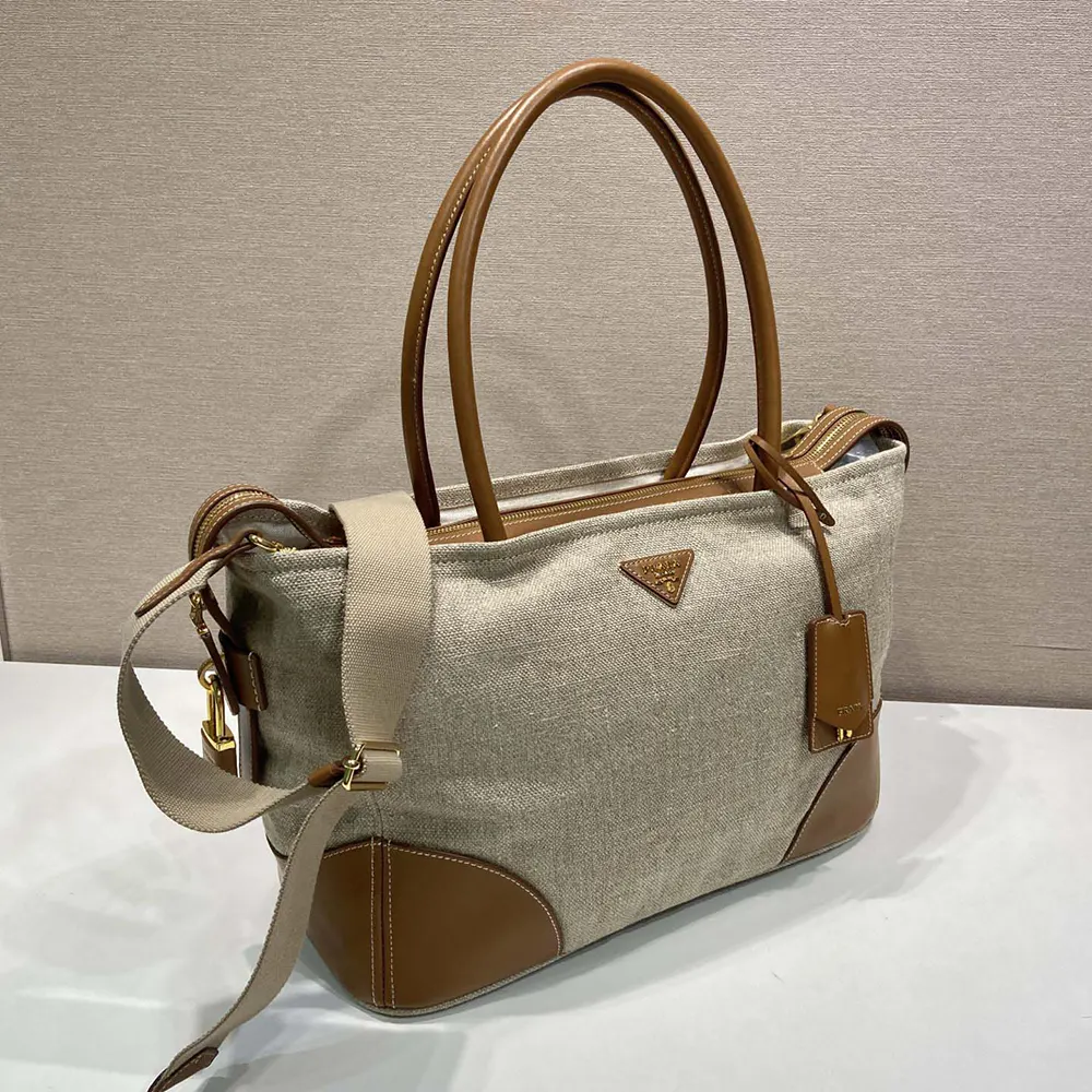 Side angle showing structured silhouette of Prada Women Large Linen And Leather Tote Bag-Rope Natural