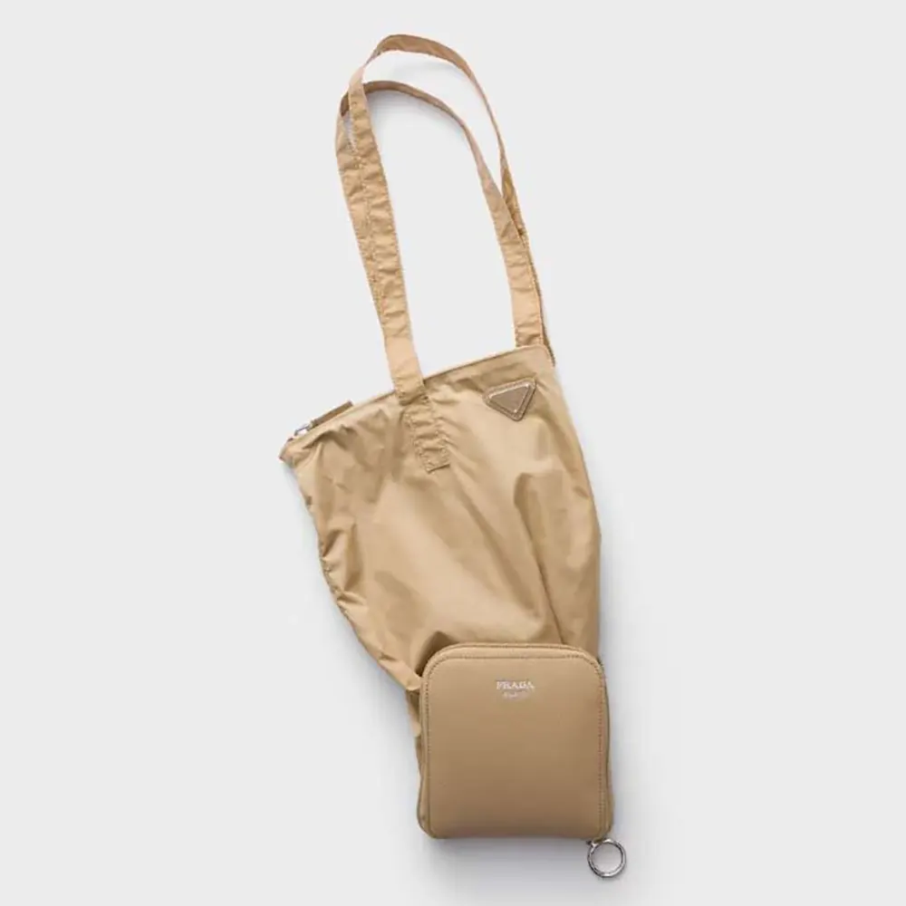 Front view of Prada Women Saffiano Leather Pendant With Re-Nylon Tote Bag-Camel Brown