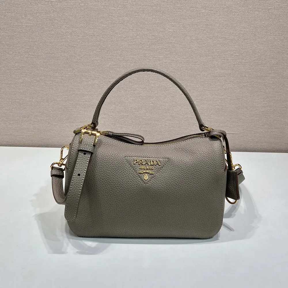 Close-up of clasp and smooth leather texture on Prada Women Small Leather Bag-Clay Gray