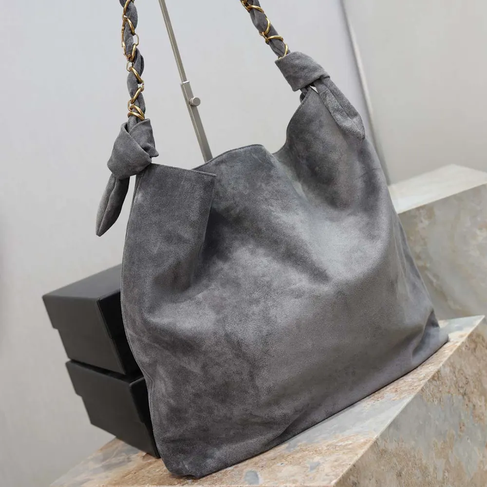 Side angle showing chain strap detail on Saint Laurent YSL Amalia bag