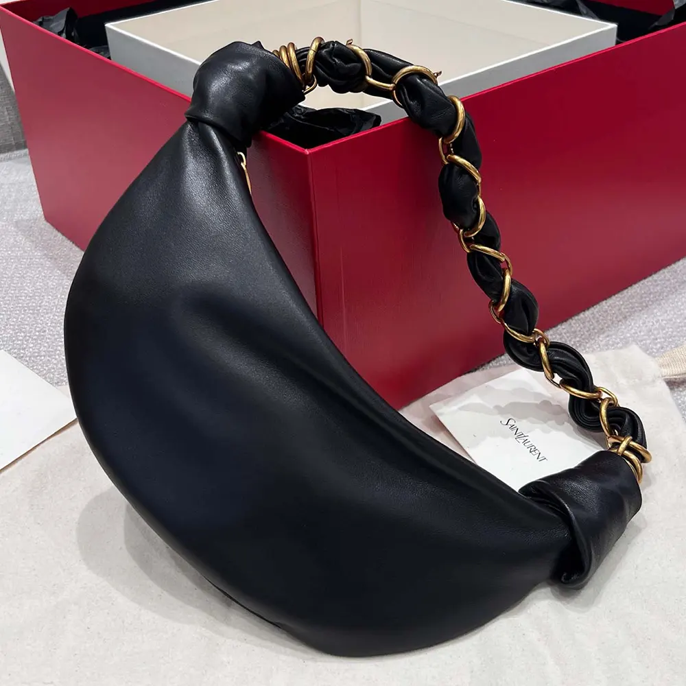 Side angle showing compact silhouette of Saint Laurent Amalia Mini Hobo