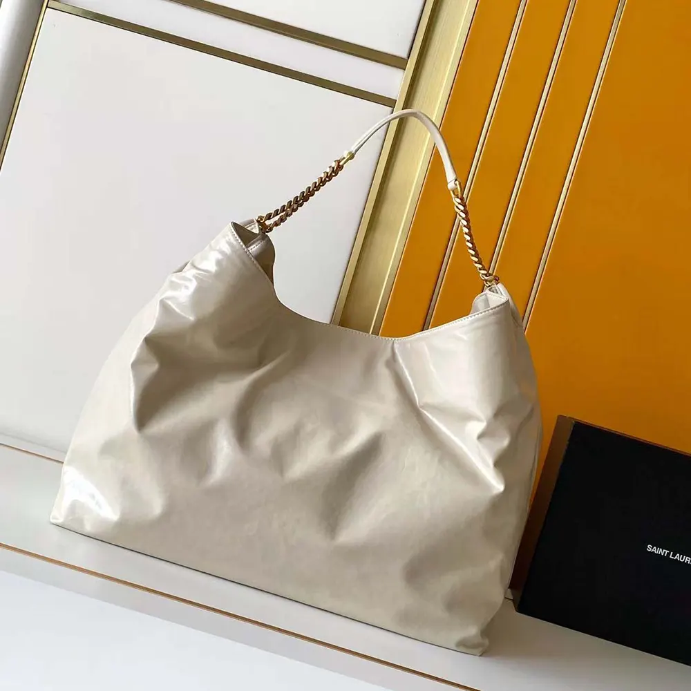 Side profile showing silhouette of Saint Laurent YSL Women Hortense Hobo bag