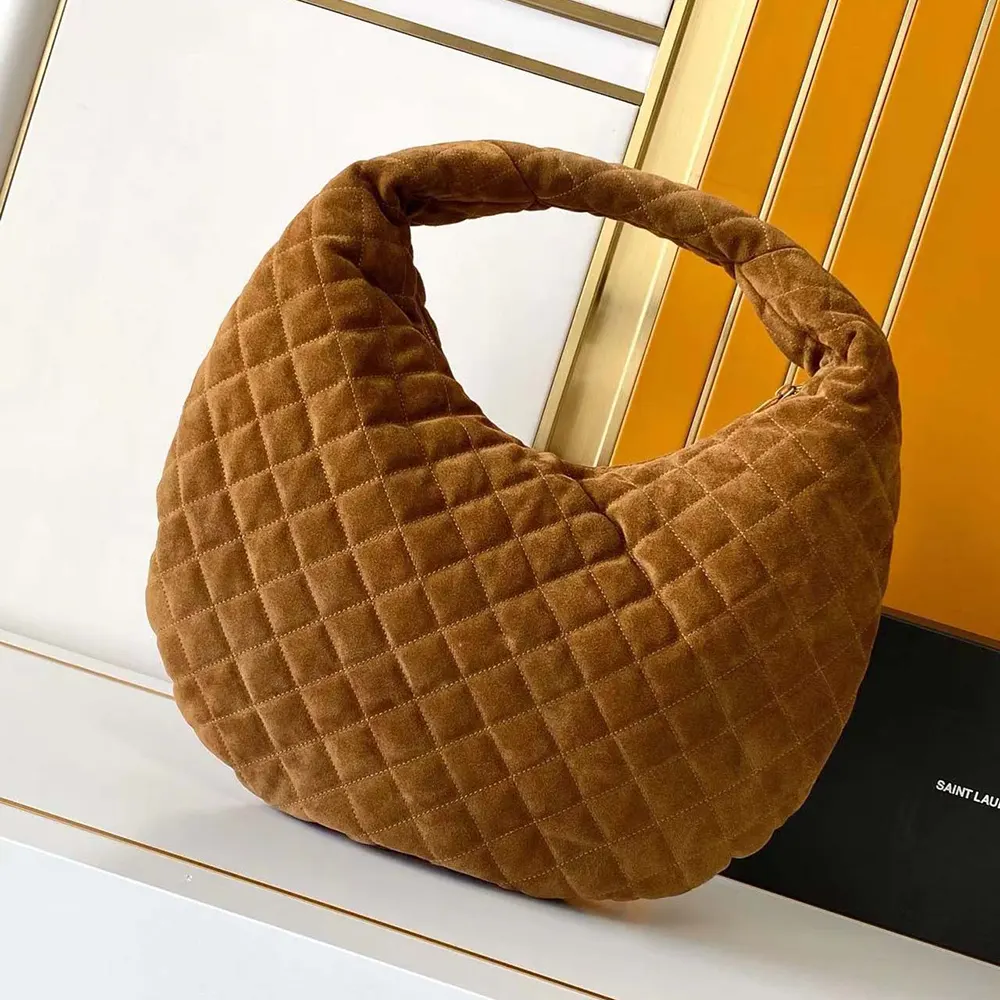 Side angle showing silhouette of Saint Laurent YSL Women Icare Hobo Brown