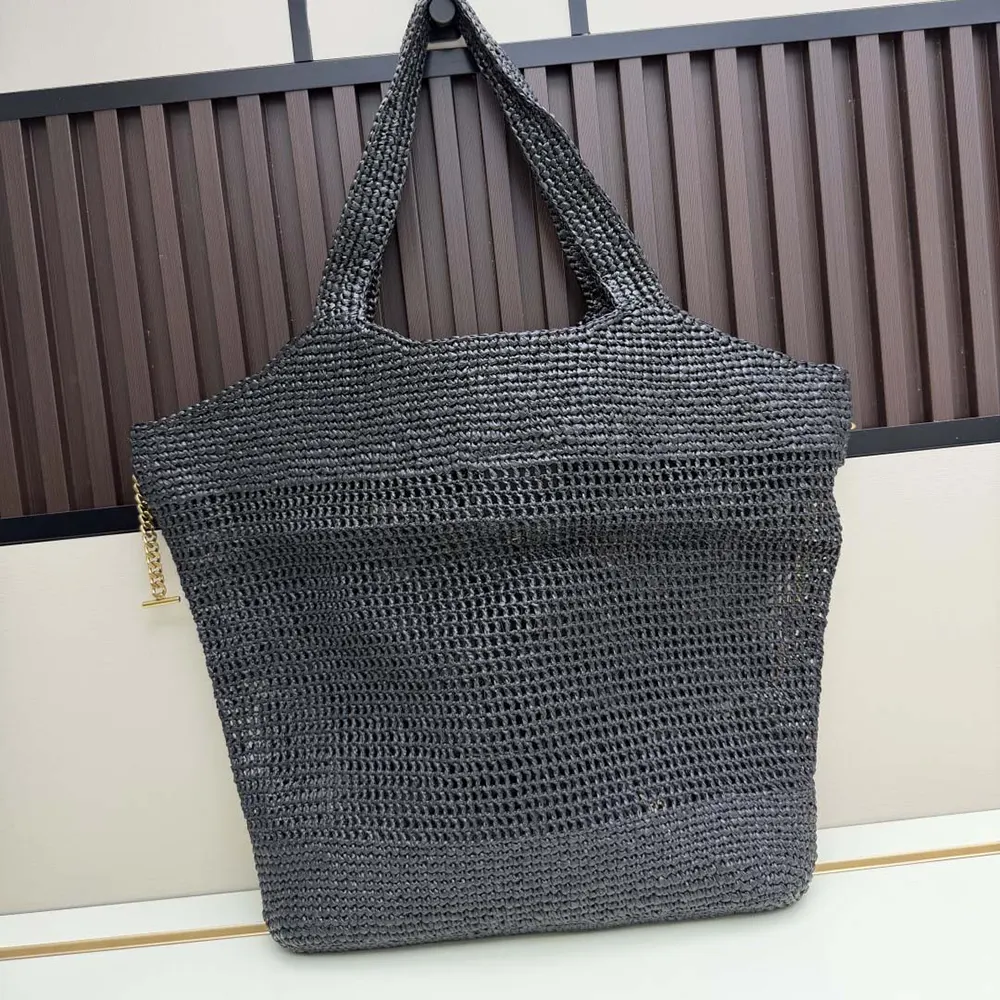 Side angle showing woven raffia texture on Saint Laurent YSL bag