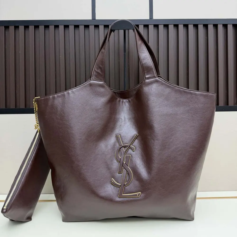 Close-up of gold YSL logo on Saint Laurent YSL Women Icare In Smooth Leather Burgundy