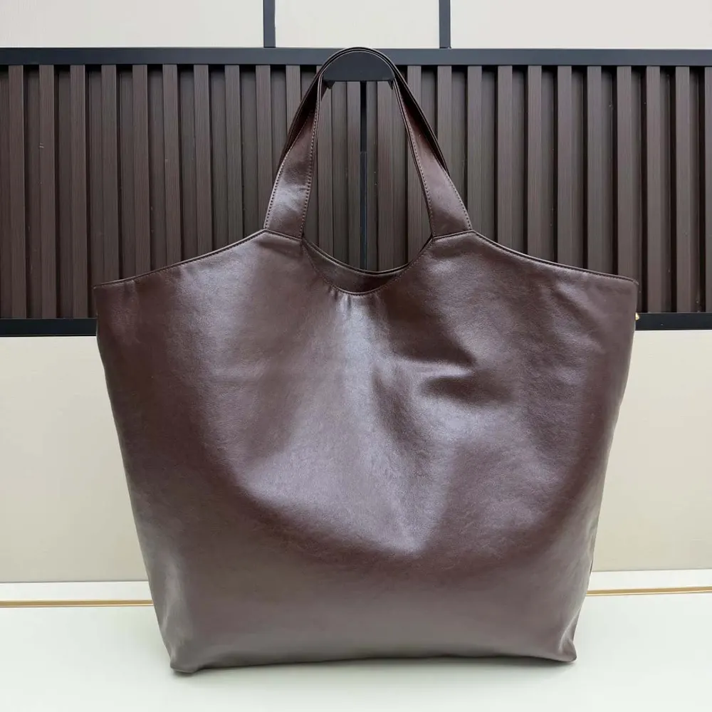 Side angle showing smooth leather texture of Saint Laurent YSL Women Icare In Smooth Leather Burgundy