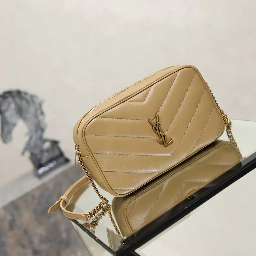 Side angle showing compact silhouette of Saint Laurent YSL Loulou Camera Bag