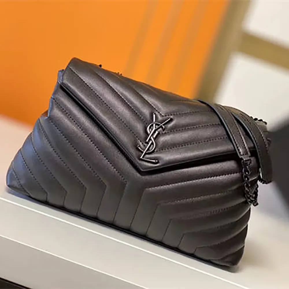 Side profile showing shape of Saint Laurent YSL Women Loulou Medium bag