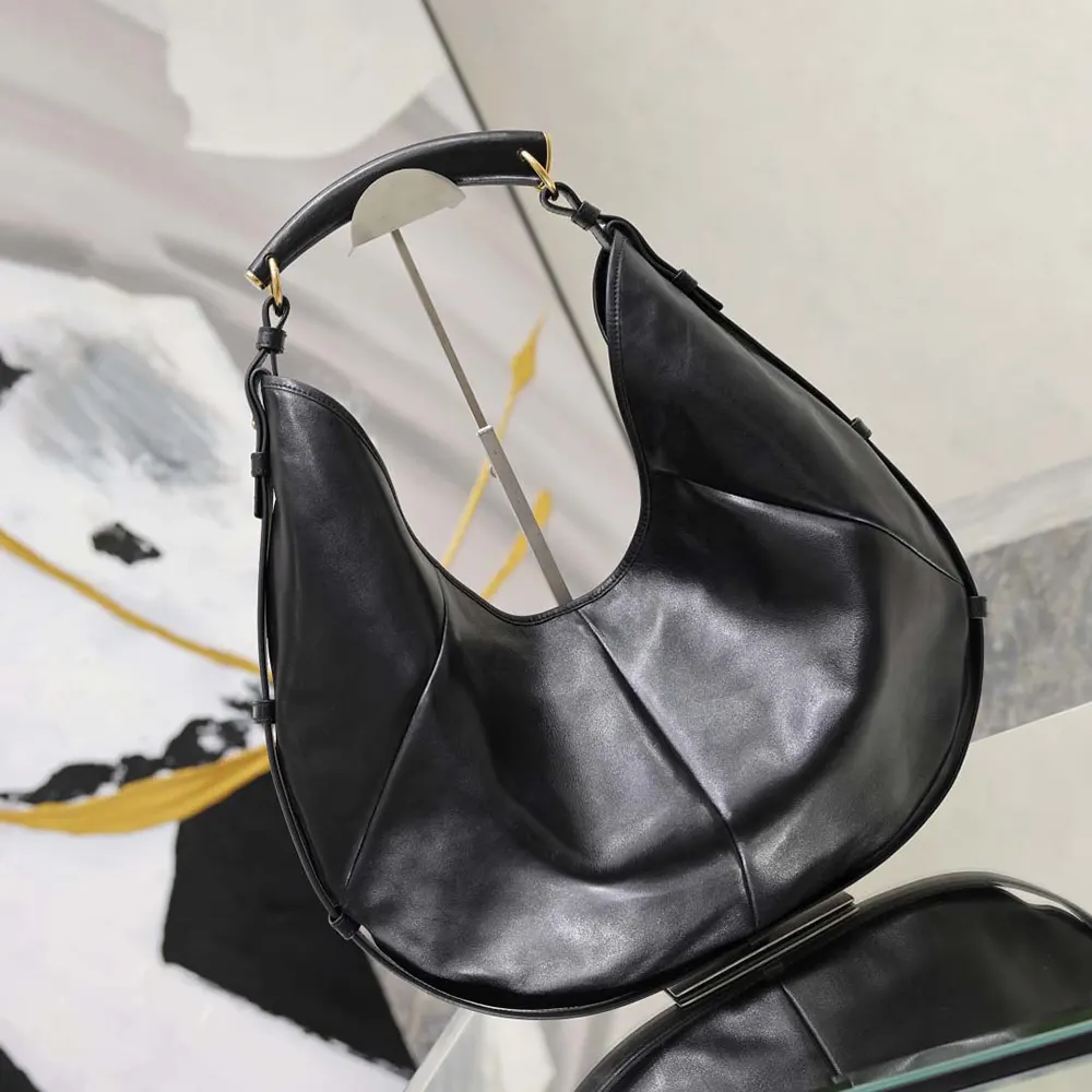 Side view showing silhouette of Saint Laurent YSL Women Mombasa bag
