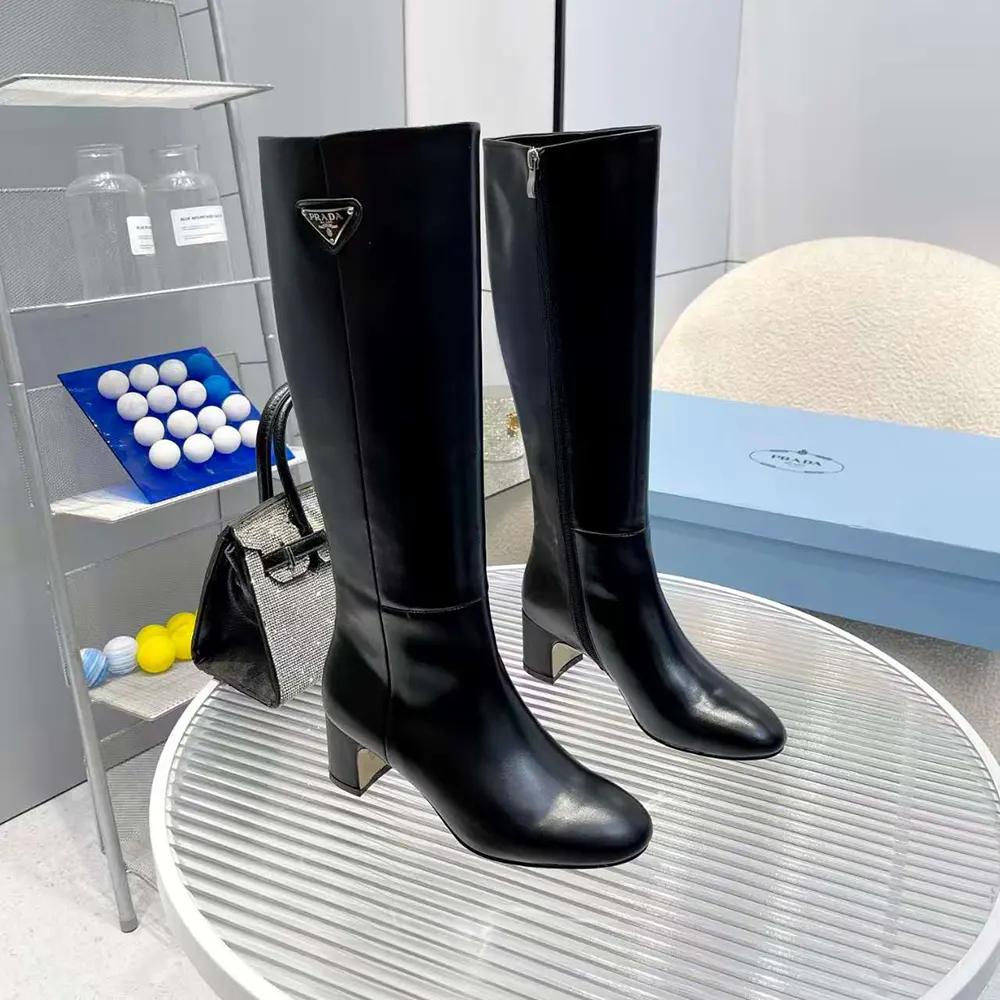 Close-up on brushed leather texture of Prada Women Brushed Leather Boots