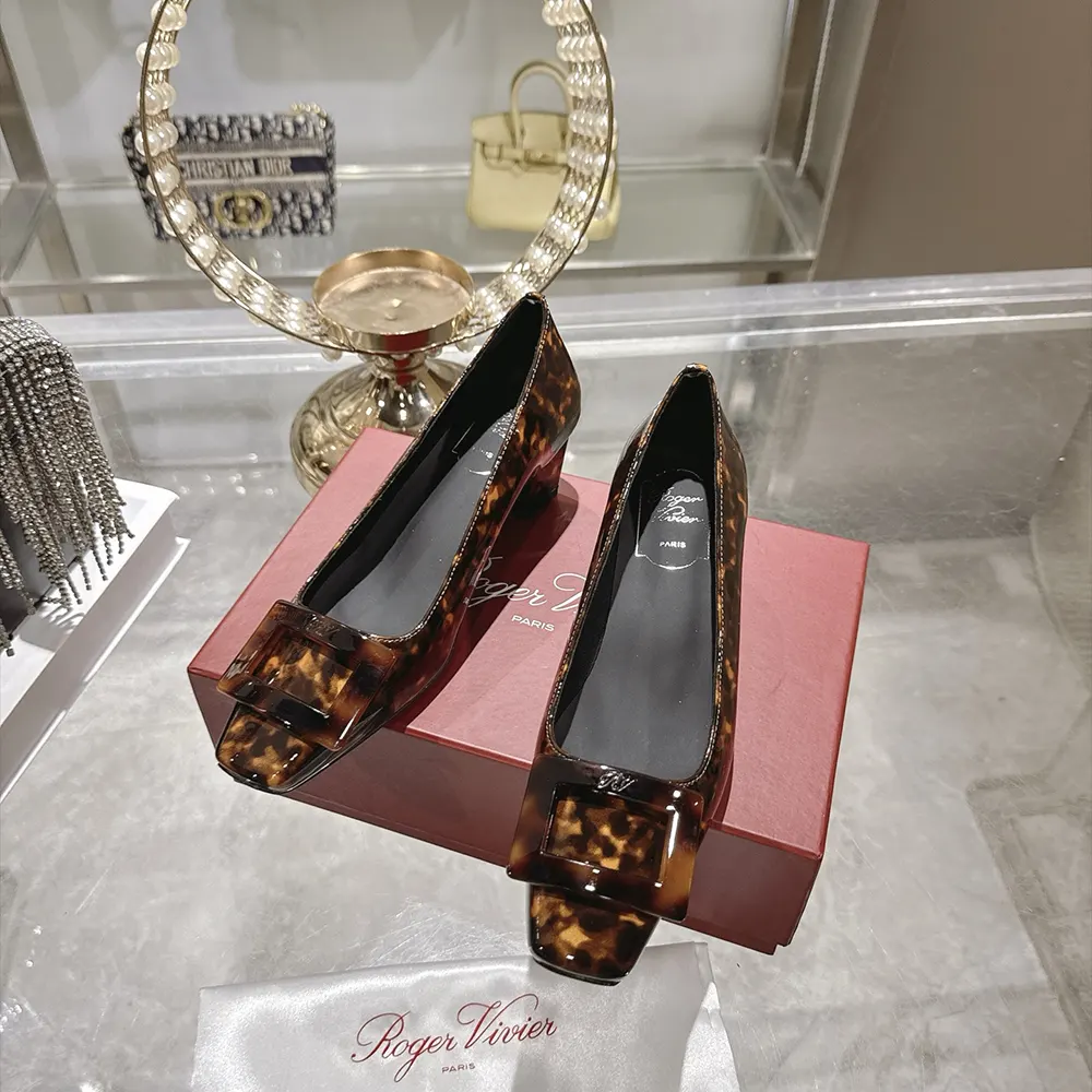 Top-down angle showing toe and glossy finish of Roger Vivier Pumps