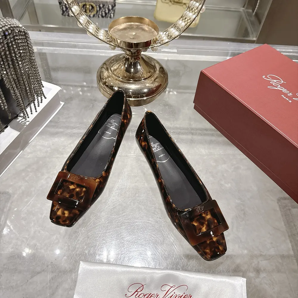 Top-down angle showing rounded toe on Roger Vivier Gommettine ballerinas