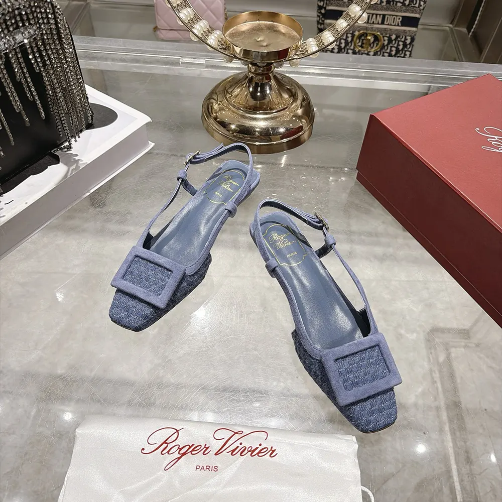 Close-up of signature buckle on Roger Vivier Gommettine Slingback Ballerinas