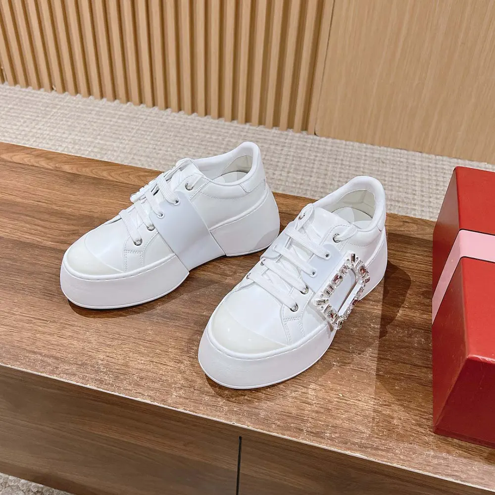 Top view detail of laces and leather texture on Roger Vivier Viv Skate Sneakers