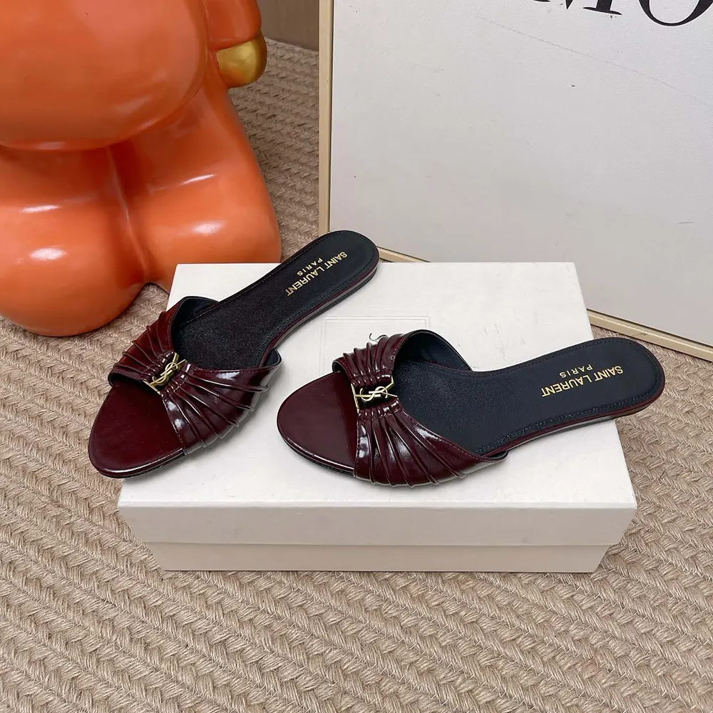 Overhead view showcasing the smooth leather finish on Saint Laurent YSL Babylone Slides