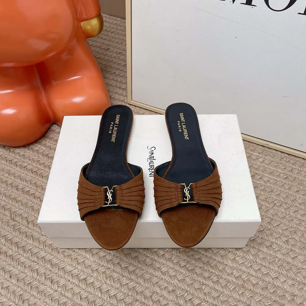 Side view showing flat silhouette of Saint Laurent YSL Babylone Slides