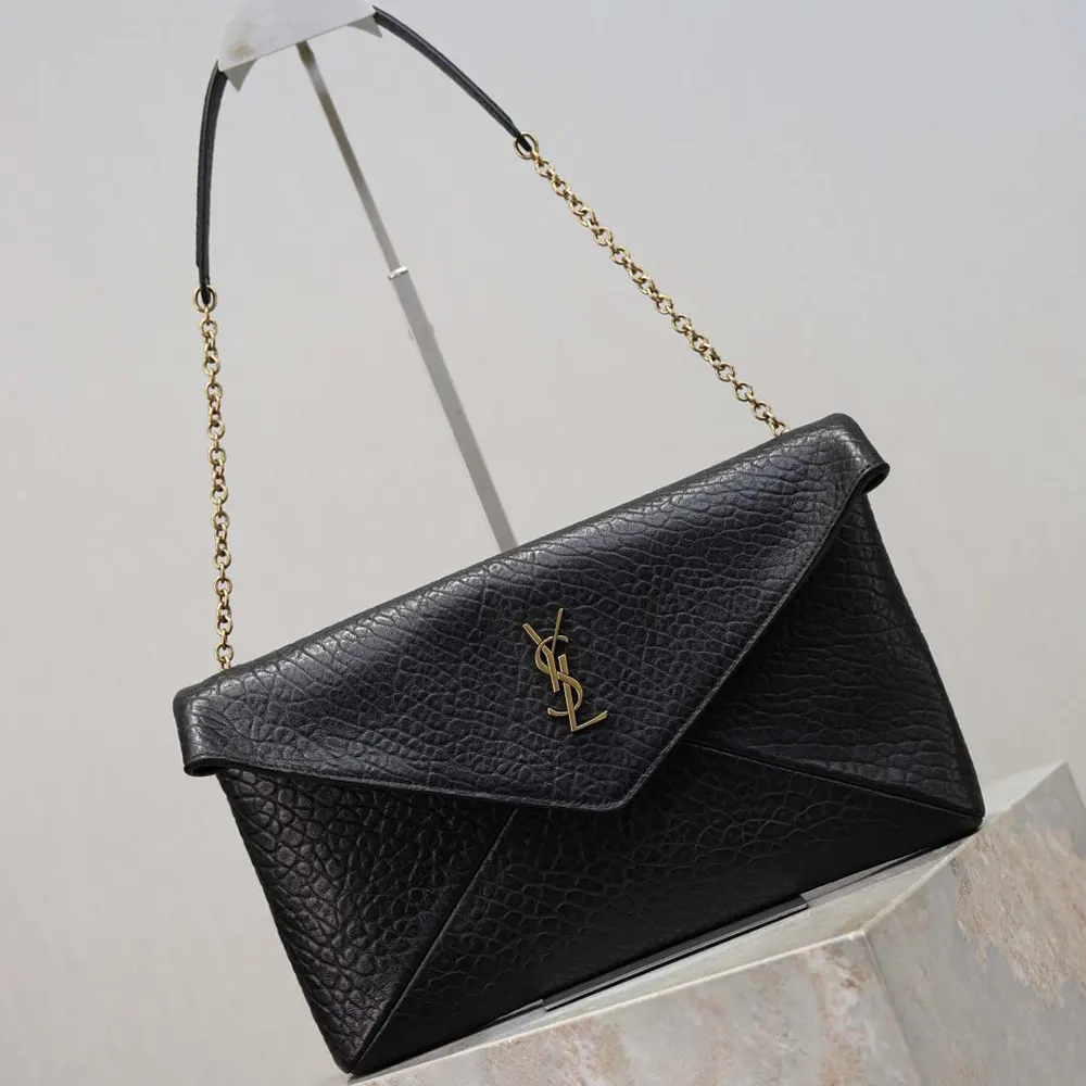 Side angle showing slim silhouette of Saint Laurent Cassandre Pouch