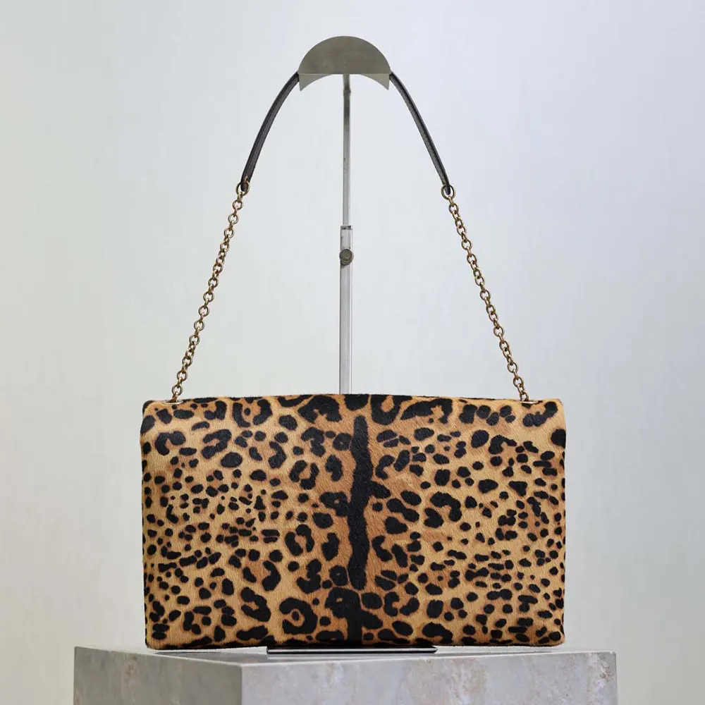 Side angle showing chain strap length on Saint Laurent YSL Cassandre Pouch
