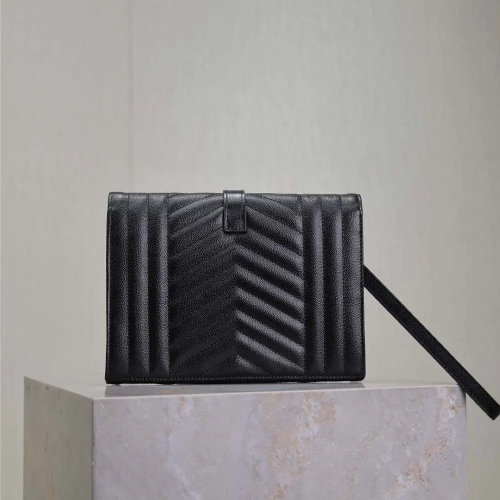 Side profile showing slim silhouette of Saint Laurent YSL pouch