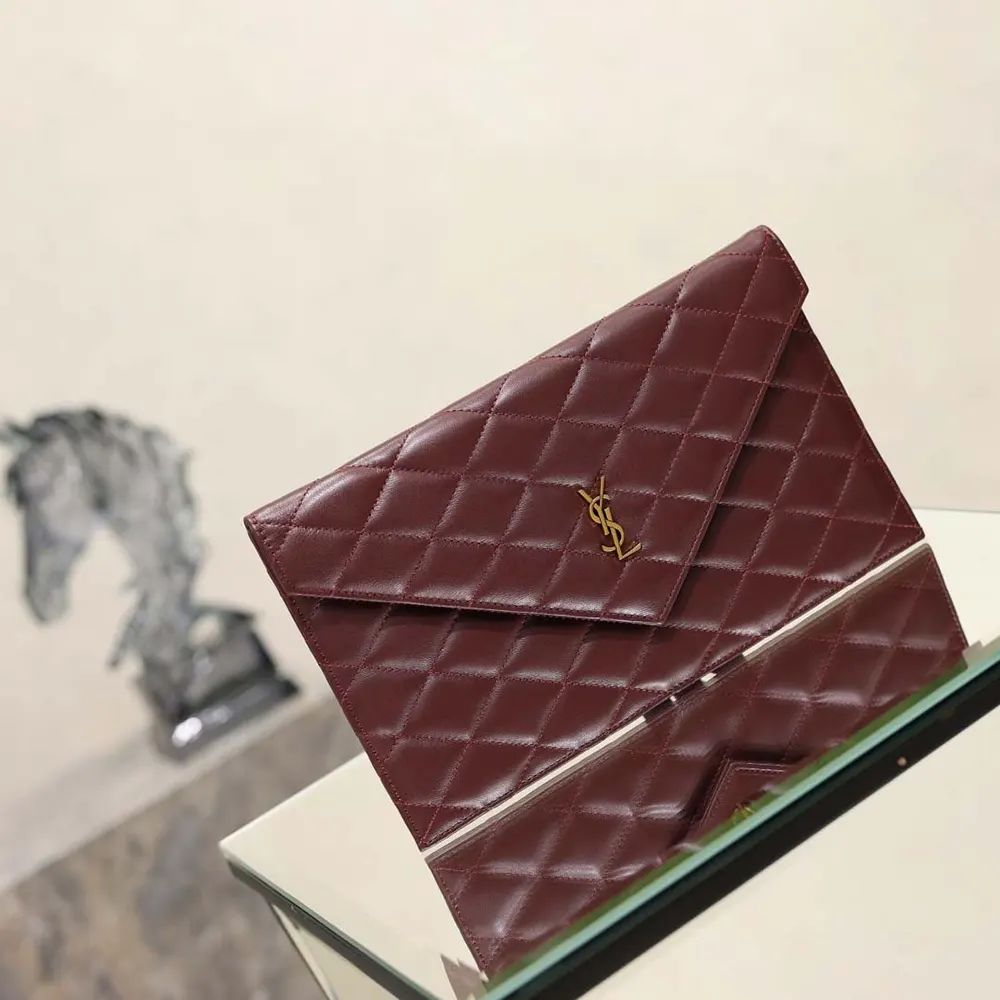 Open view of Saint Laurent YSL Women Paris Pouch revealing interior space and leather finish