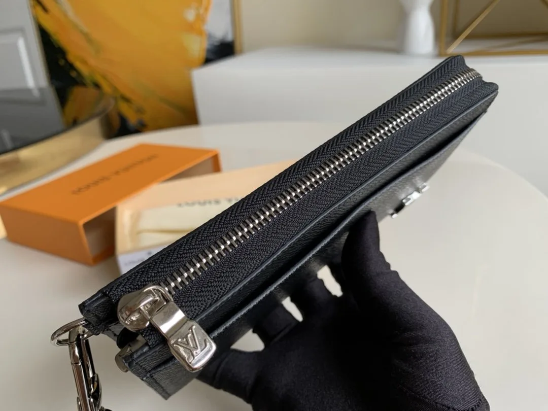 Louis Vuitton Zippy Dragonne Wallet Taiga Black - Image 4
