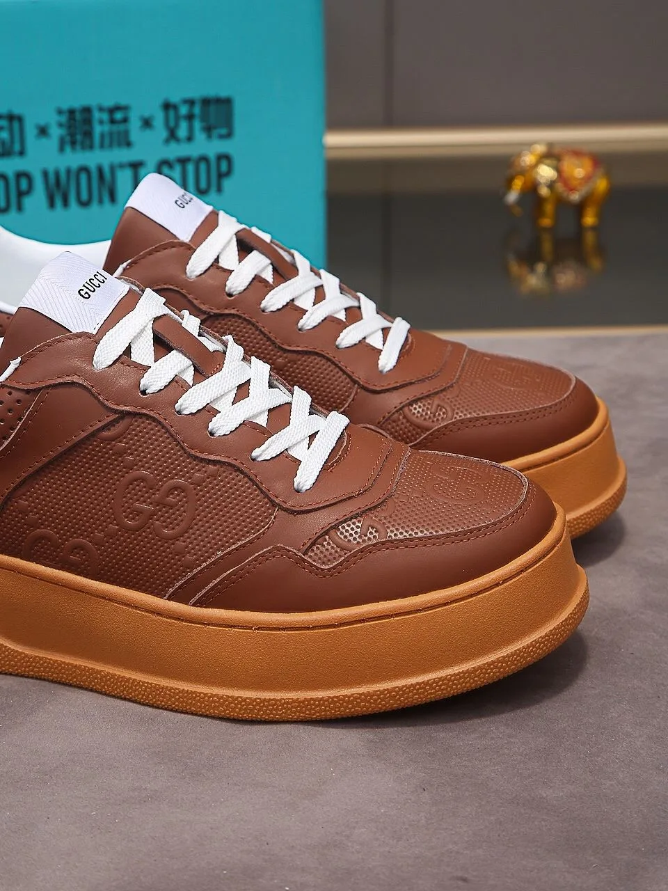 Alternative view of Gucci Men’s GG Embossed Sneaker Brown