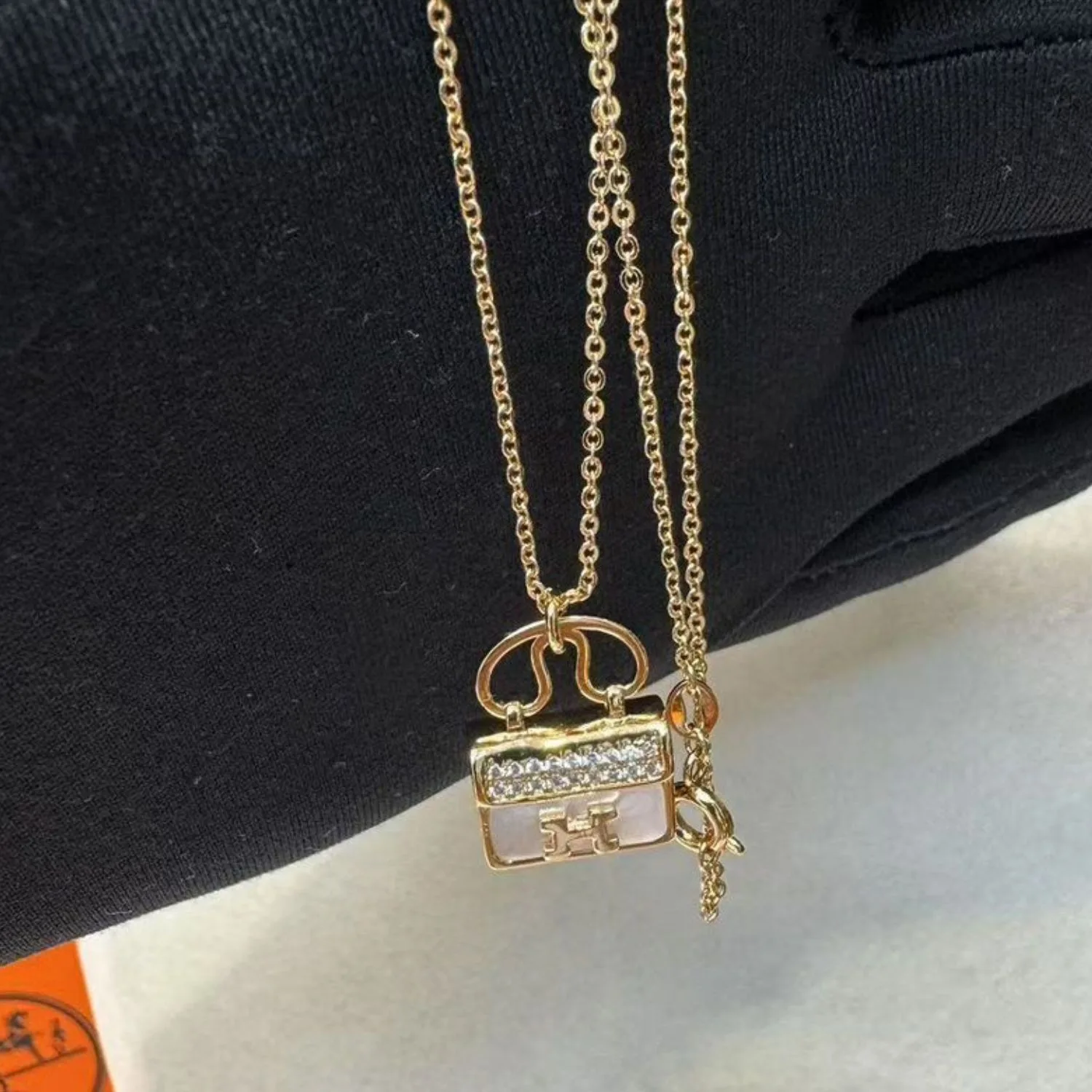 Alternative view of Hermes Amulettes Constance Necklace Gold Tone