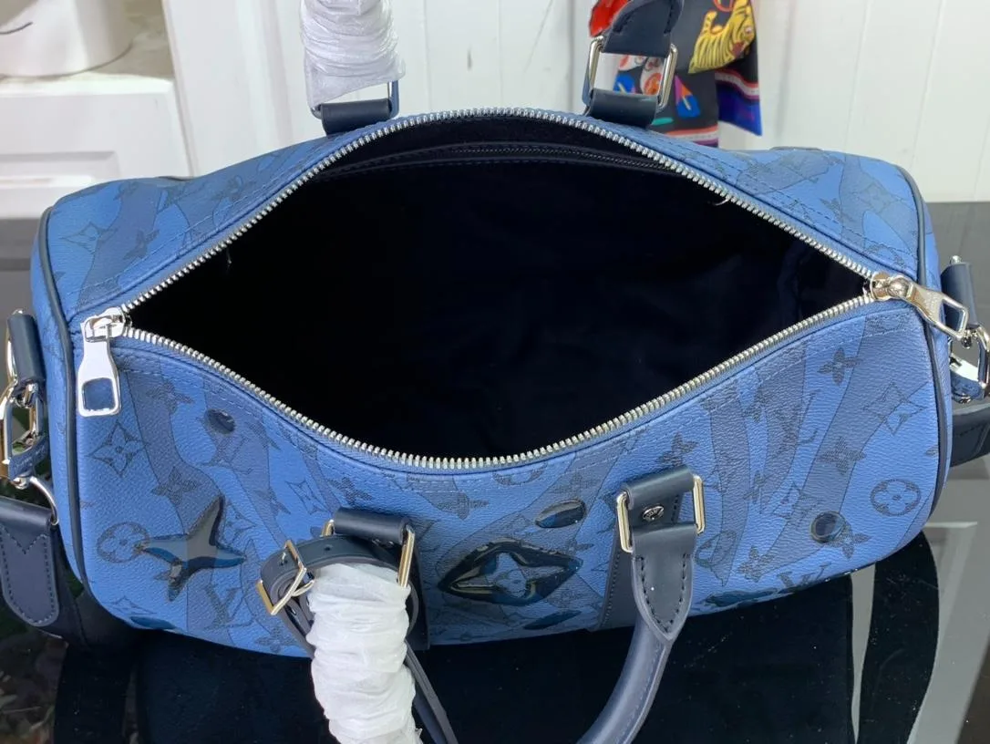 Louis Vuitton Keepall Bandouliere 35 Travel Bag / Blue Silver Hardware - Image 11