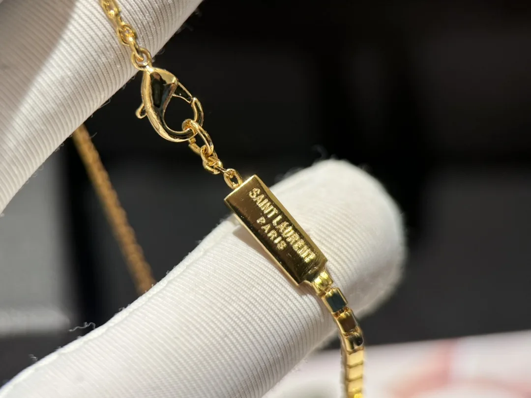 Saint Laurent Cassandre Charm Bracelet In Crystal And Gold YSL - Image 4